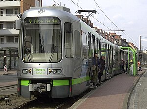 A streetcar (or Tram) drawing current from a s...