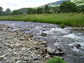 Parte rapide del fluvio Chuprene presso le village de Targovishte, Bulgaria