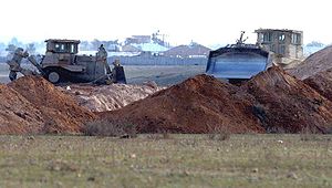 USMC Caterpillar D9 armored bulldozer. The civilian tractor is fitted with an armor kit, produced by Israel defence industries.