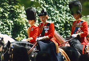 Photograph of Queen Elizabeth II riding to tro...