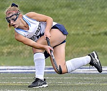 An American high school field hockey player wearing goggles and a mouthguard Field hockey player with goggles and mouthguard (50413699032) (cropped).jpg