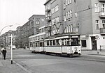 Tw 3751 (T 33 U) mit Bw 1543 (BDM 26) auf der Linie 66 in der Belziger Straße, 1963
