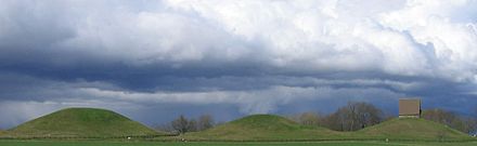 Royal burial mounds and church at Gamla Uppsala, where Adam of Bremen described a large temple Royal mounds.JPG