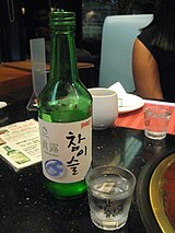 Soju, a Korean distilled drink served at funerals Soju in korean restaurant.JPG