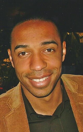 Thierry Henry smiling.