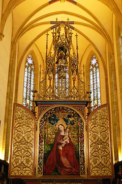 Martin Schongauer: Die Madonna im Rosenhag (1473) im Chor der Kirche