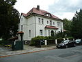 Villa mit Einfriedung