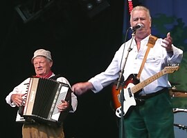 Tommy Banner and Pete Budd performing at the 2011 Wychwood Festival