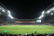 The stadium's first ever international cricket match, a Twenty20 International between Australia and India (pictured), took place in February 2012. ANZ Cricket.jpg