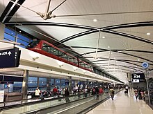 Detroit Metropolitan Wayne County Airport (DTW), the principal airport serving Detroit, is located in nearby Romulus. DTW McNamara terminal interior (29559579673).jpg