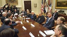 Former president Donald Trump with automobile industry leaders, 2017 Donald Trump and Mike Pence meet with automobile industry leaders.jpg