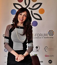 Элизабет Филиппули выступает на Глобальном форуме мыслителей «Лидерство и сотрудничество» в HomeHouse в Лондоне 27 марта 2014 г.