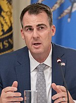 Stitt addresses his remarks during a roundtable discussion with Governors and small business owners on the reopening of America's small businesses. Kevin Stitt 2020.jpg