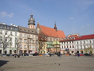 Plac Wolnica, a central market square in the Kazimierz district. The Polish Gothic Corpus Christi Basilica can seen in the background.