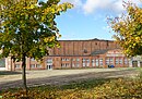 Reste der Lokomotivfabrik Drewitz der Firma Orenstein & Koppel: Bürogebäude (Haus 55), Portiergebäude (Haus 3), „Zirkus“ (Hallen 47-54), Halle mit Querhaus (Halle 60), mehrschiffige Halle (Halle 63)