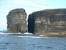 View of Diarmuid and Gráinne's Rock and Lovers' Leap at Loop Head in west County Clare, Ireland.