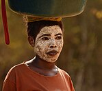 A Malagasy woman wearing masonjoany