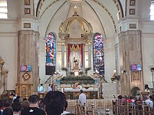 High altar of the church, with the Black Nazarene enshrined above it Quiapo Church high altar 2023-06-16.jpg
