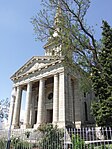 Impressive neo-classical church based on Sir Christopher Wren's design for St Martin in the Field, Trafalgar Square, London. Fine detailing in stone, especially clock tower. Impressive pedimented stepped entrance supported by stone columns. This church building is situated on the same site where the first Dutch Reformed Church in Cradock was built between 1821 and 1824. Construction work on the present church commenced in January 1864 and it was consecrated on 10 September 1868. Type of site: Church. Current use: Religious.