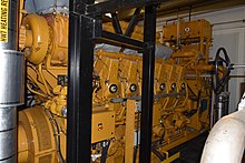 Stationary 12 cylinder turbo-diesel engine coupled to a generator set for auxiliary power 12 Cylinder Diesel Engine.jpg