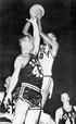 Loyola's Vic Rouse shoots over Mississippi State's Aubrey Nichols