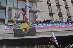 Pro-Russian protests in Donetsk on 7 April 2014. The DPR first flag variant is seen displayed amongst other flags such as the Russian, Belarusian and Donetsk Oblast ones. 2014-04-07. Protesty v Donetske 005.jpg