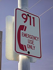 Sign reading "911 emergency use only"