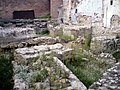 Fondamenta del teatro romano visibili nel Carrer de les Eres