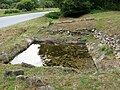 Reste des einstigen Lavoirs im Ortsteil Champotier