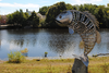 A sculpture at Mill Pond Park along the banks of Mother Brook