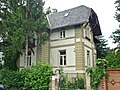 Villa mit Einfriedung