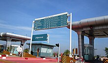 Use of furlongs on a highway sign near Yangon in 2010 Naypyitaw Tollbooth.jpg