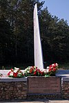 Pomnik lotników z 1964 roku, upamiętniający pierwszy lot bojowy 1 Pułku Lotnictwa Myśliwskiego odbyty 23 sierpnia 1944 r.