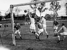 1937 soccer match at Lang Park Milton (looking towards Milton Road) - teams not known StateLibQld 1 194039 Shot for goal during a soccer match in Brisbane, ca. 1937.jpg