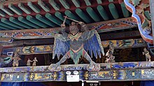 Wooden sculpture of the eagle-faced Thunder God (Lei Shen 
Leishen), punisher of those who go against the order of Heaven, at the Temple of the Eastern Peak of Baishan in Pu, Linfen, Shanxi. In the oldest accounts, he is one and the same with the Yellow Emperor. Bo Shan Dong Yue Miao Xing Gong Da Dian Diao Su .JPG