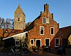 Pand met Noord-Hollandse gevel met klimmende pilasters met achterzijde aan de Torenstraat (nr. 1)