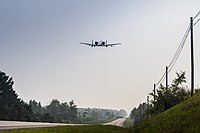 An A-10 Thunderbolt II from Selfridge Air National Guard Base, Michigan, prepares to land on a public highway in Alpena, Michigan, August 5, 2021