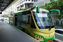 Modern green-and-yellow bus