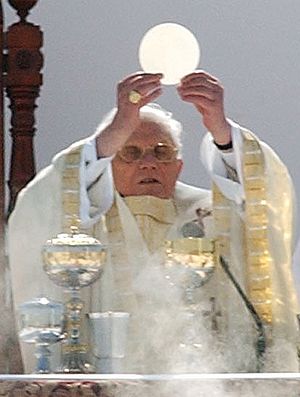 Pope Benedict XVI celebrates the Eucharist, a ...