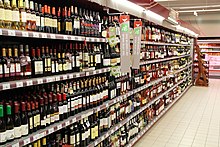 The wine aisle of a French hypermarche Carrefour Market Voisins-le-Bretonneux 2012 13.jpg