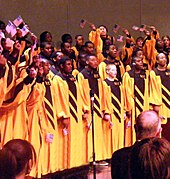 The choir performing the "Battle Hymn of the Republic" at the school's 2006 Hall of Fame Assembly Choir, Baltimore City College (2007).jpg