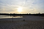 Het strand aan de vijver