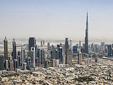 Russian commodities traders relocated from Switzerland to Dubai. Dubai skyline 2015 (crop).jpg