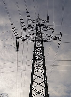 English: Electricity Pylon, crossing lines Deu...