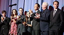 A photograph of the cast of Inception, including Leonardo DiCaprio on the right.