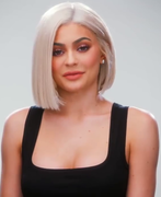 Influencer Kylie Jenner wearing make-up popular in the latter part of the decade.