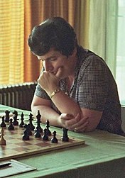 Gaprindashvili staring at the board while playing chess