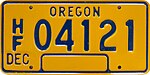Номерной знак для тяжелых грузов с фиксированным грузом штата Орегон - короткие номера, желтый, декабрь.jpg