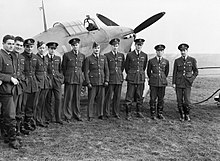 Pilots of No. 1 Squadron RCAF in the UK, October 1940. The squadron was deployed to the UK in June 1940, shortly before the Battle of Britain. Pilots of No. 1 Squadron RCAF with one of their Hawker Hurricanes at Prestwick, Scotland, 30 October 1940. CH1733.jpg
