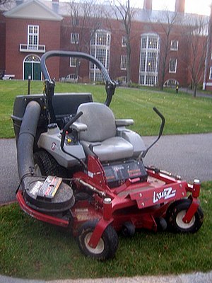 A riding mower on the campus of Harvard Busine...